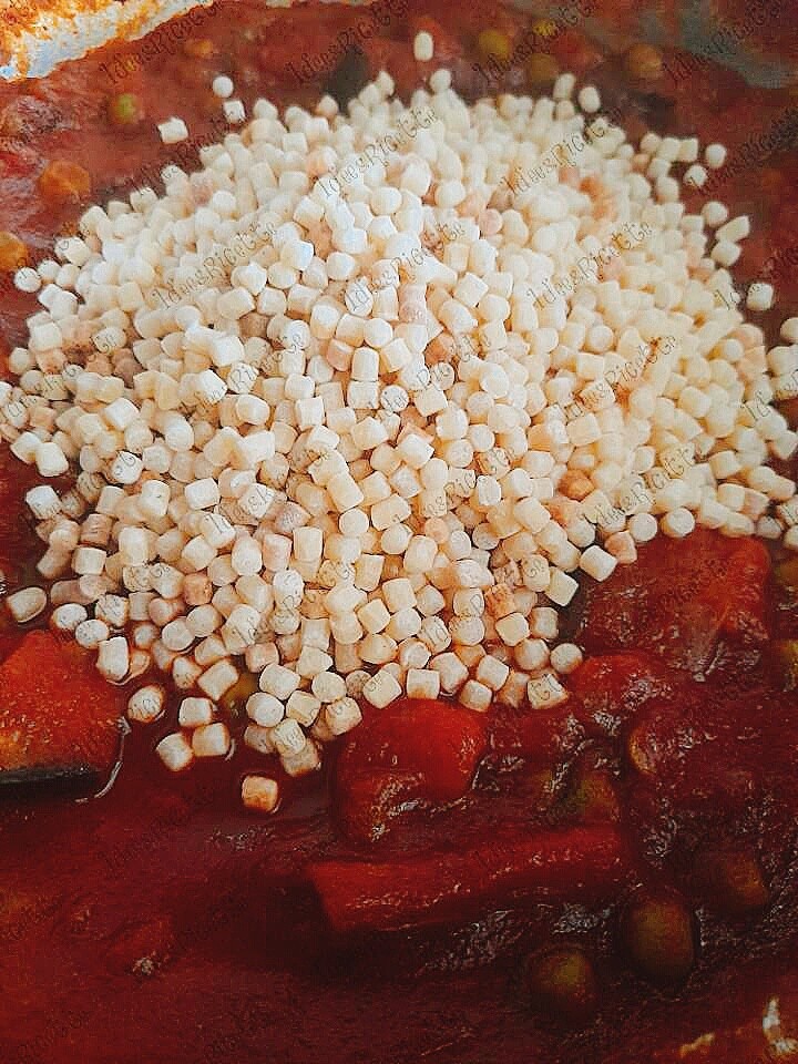 Fregola con piselli e melanzana 